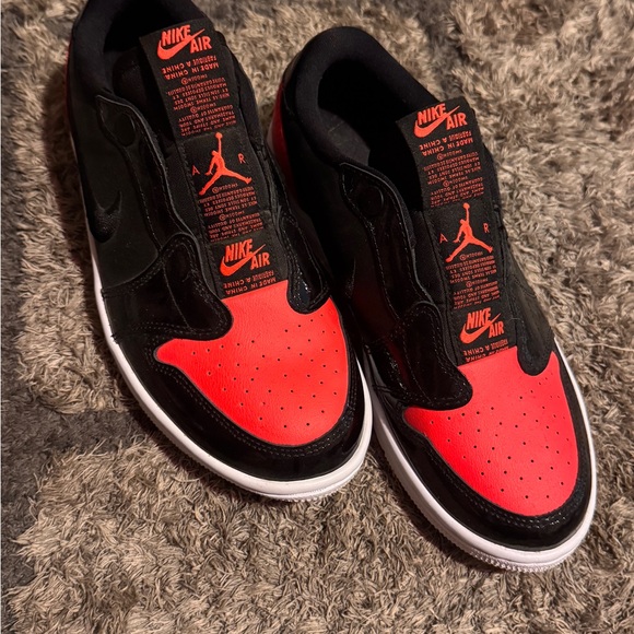 Nike Air Jordan 1 Black and Red Athletic Shoes - Picture 2 of 4